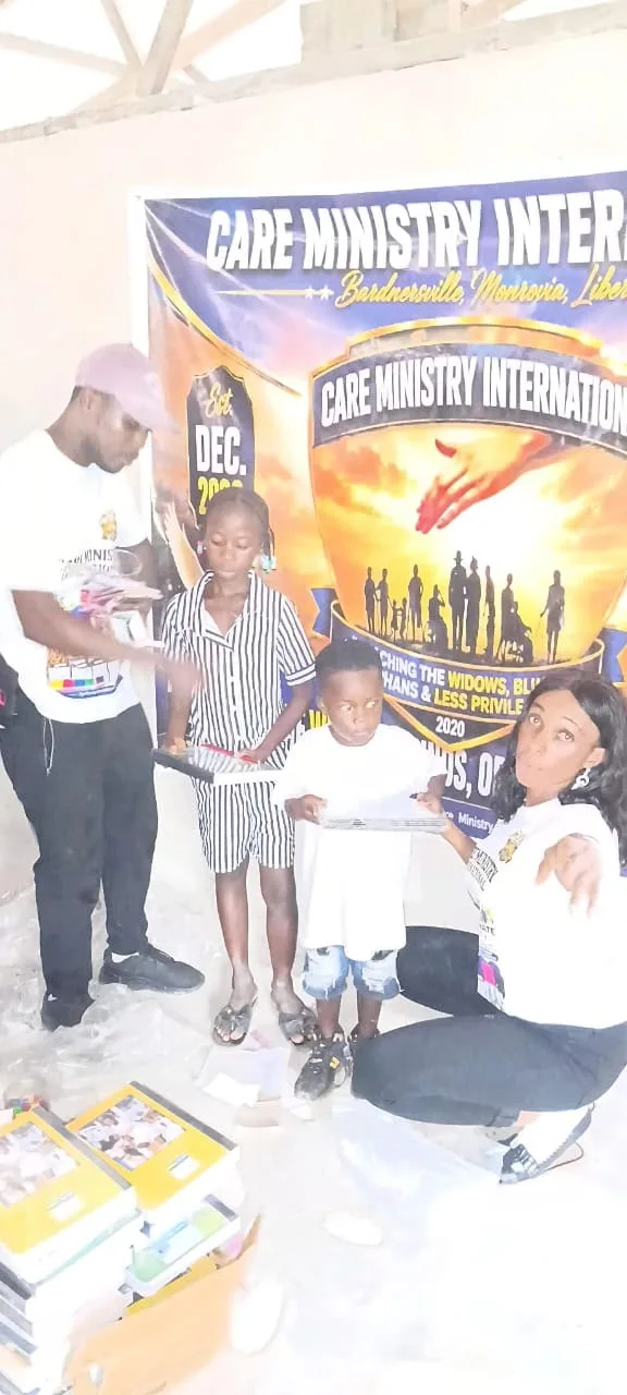 Ministry team presenting educational materials to children